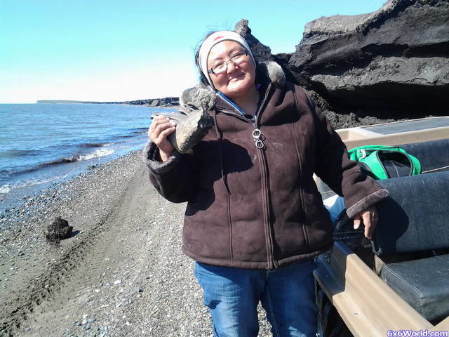 My wife Bea and a mammoth tooth she found